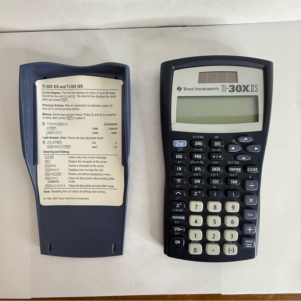 Texas Instruments TI 30X IIS‎ scientific calculator solar power or battery